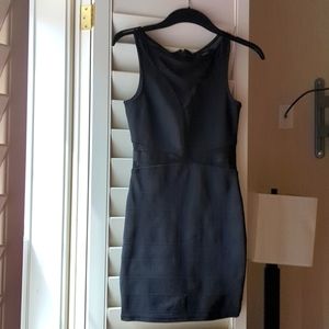 Forever 21 black mini dress.Small. Mesh detail on bust and waist. Tight fitting.